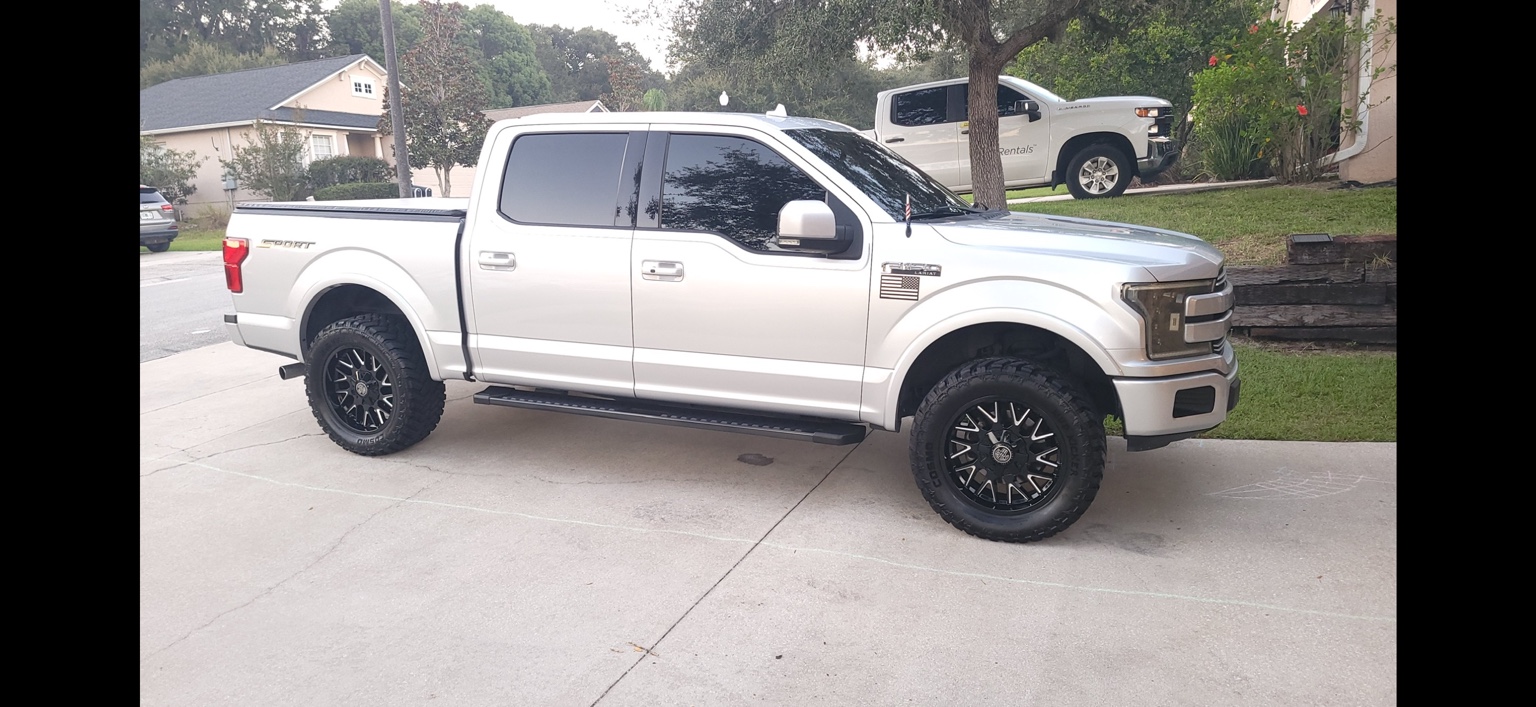 White Ford F-150 with tinted windows